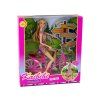 Bambola su bicicletta rosa