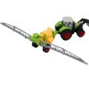 213016 2 zeleny zemedelsky traktor s bagrem a postrikovacem