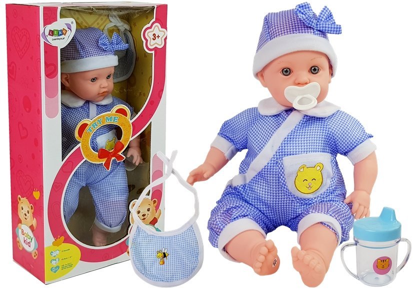 Lutka z modrim oblačilom in dodatki