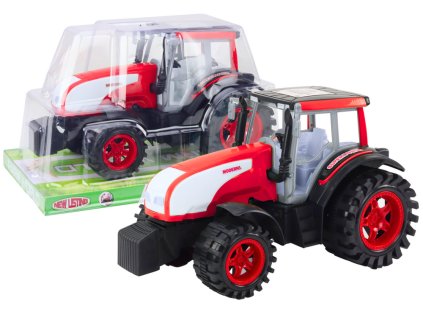 Veľký poľnohospodársky traktor s pohonom červený