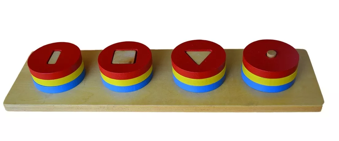 Moyo Montessori Moyo Montessori Farebné kruhové tehly s rôznymi tvarmi vnútri