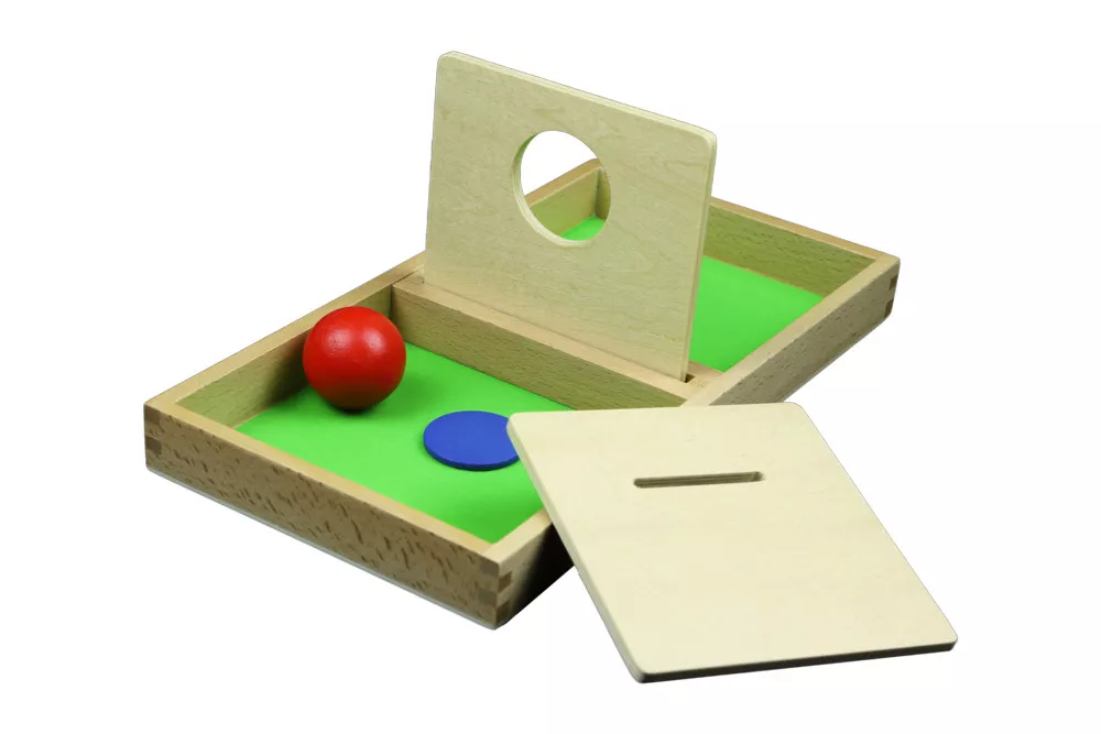 Moyo Montessori Moyo Montessori Doska s otvorom na prestrkávanie loptičky a disku