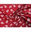 bavlnene platno svazek bilych folklornich kvetu na cervene