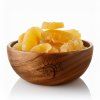 pineapple in wooden bowl