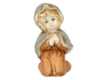 Modlící se dítě v kleku