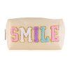 Kosmetická taštička s nášivkou "SMILE"