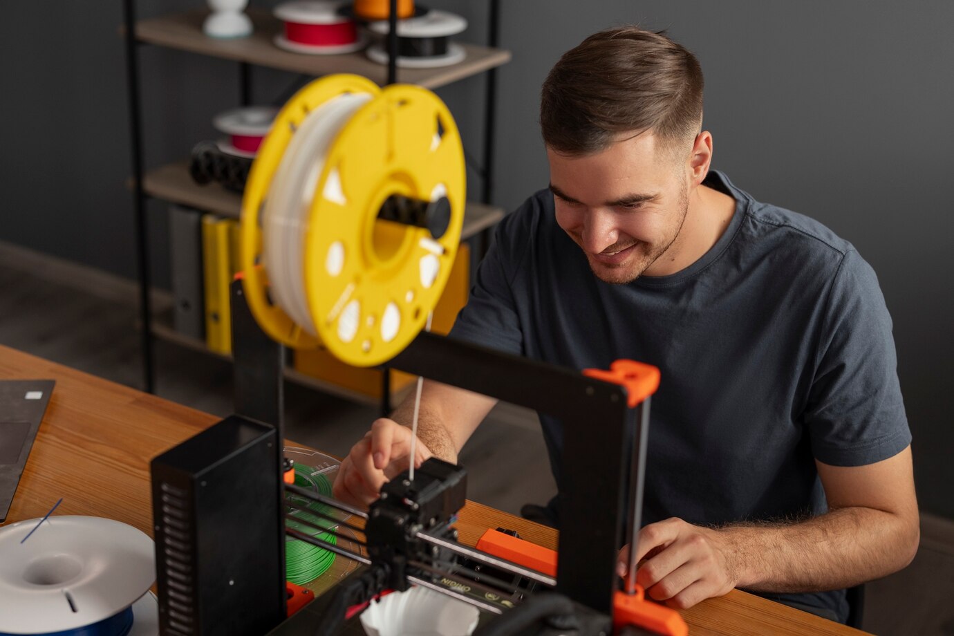 designer-using-3d-printer_23-2150941998