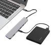 USB-C 7v1 dokovací stanice s externím diskem připojeným k notebooku