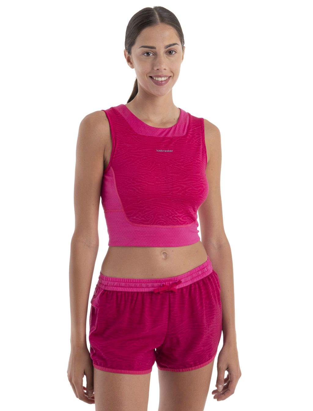 Dámské merino tílko s podprsenkou ICEBREAKER Wmns Merino 125 ZoneKnit Cropped BraTankTopo, Electron Pink/Tempo/Aop velikost: S