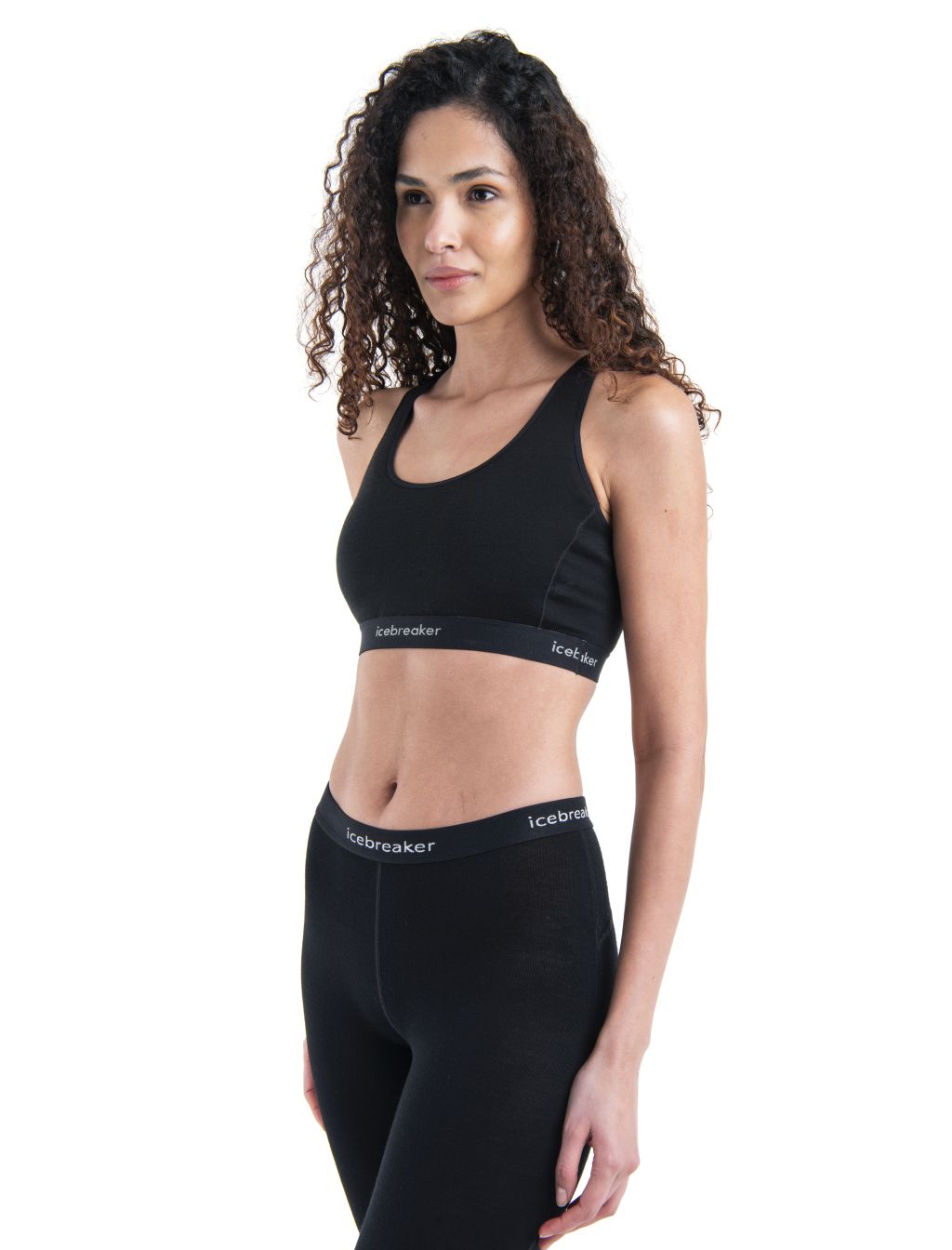 Dámská merino podprsenka ICEBREAKER Wmns Merino 125 ZoneKnit™ Racerback Bra, Black velikost: XS