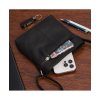 Čierna dámska kožená crossbody kabelka Beltimore s nastaviteľným ramenným popruhom a predným vreckom na zips.