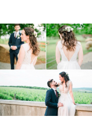 Svatebni saty s bavlnene krajky s hlubokym vystrihem