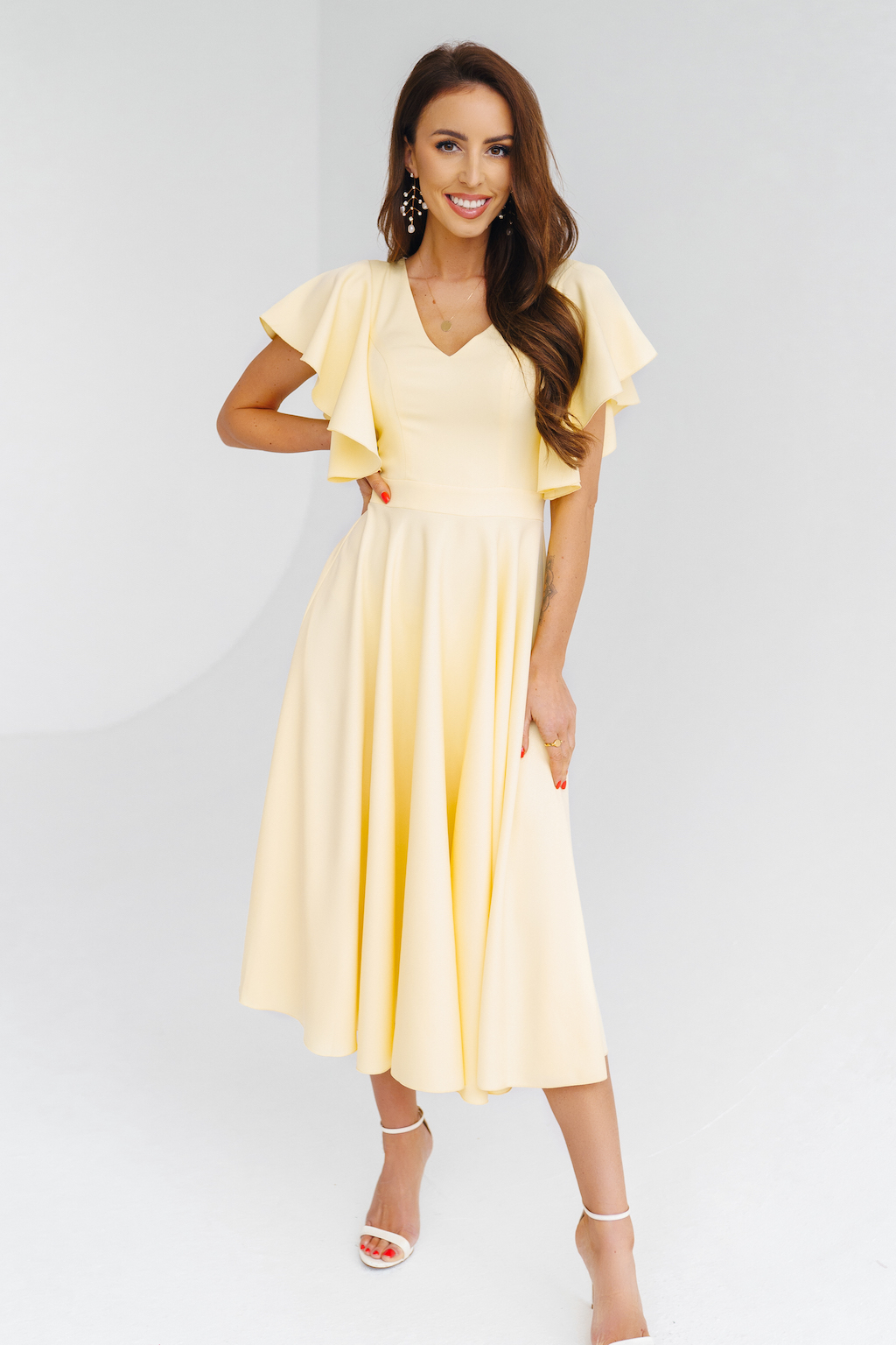 Warsaw Dress Žlté midi šaty s volánovými rukávmi Veľkosť: XS