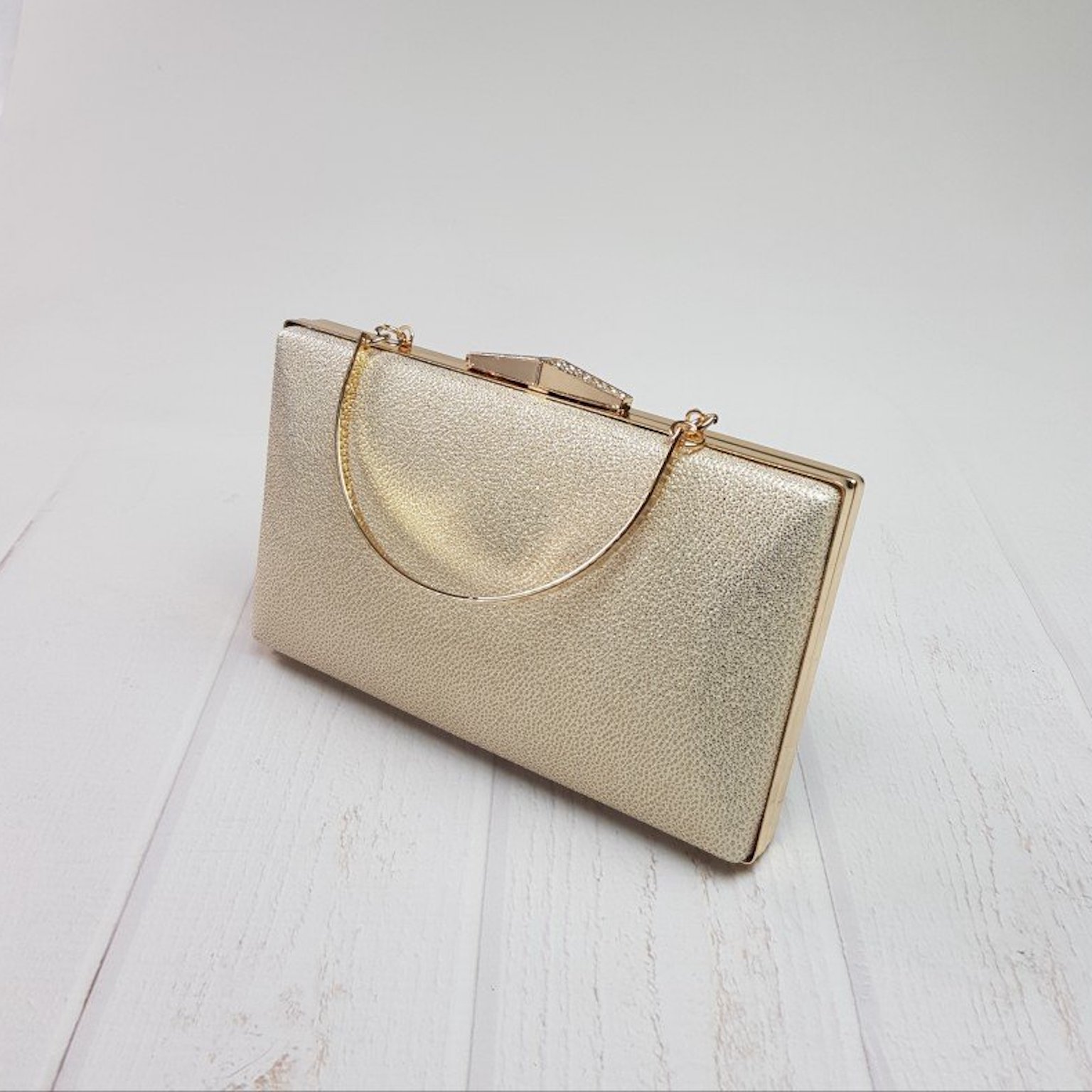 Zlatá trblietavá kabelka