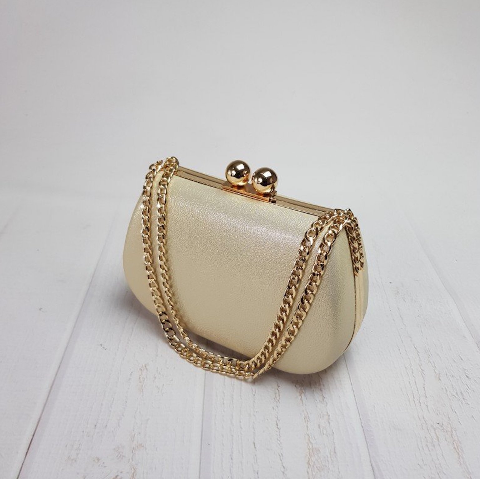 Zlatá trblietavá kabelka