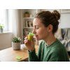 Woman smelling small 202604011108