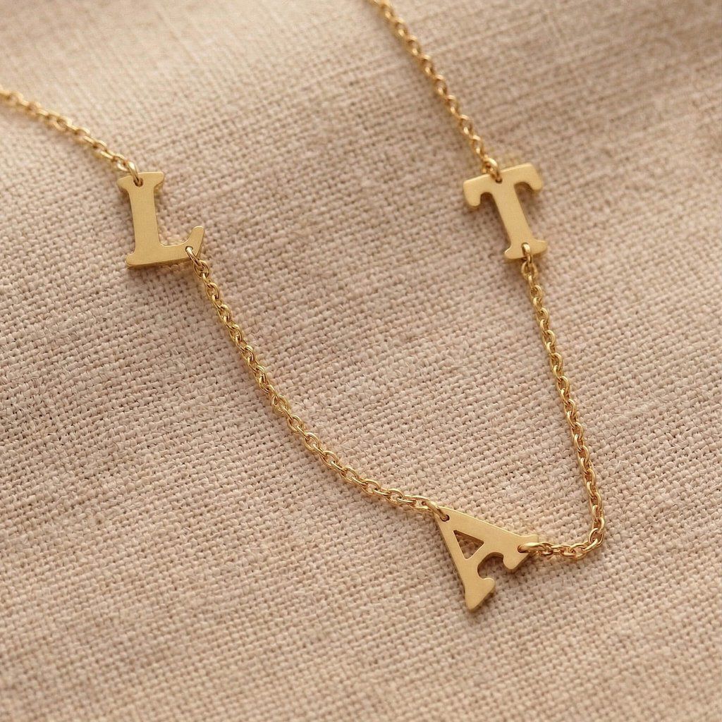 damsky_nahrdelnik_s_pismenky_na_prani