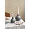 KAH two Grey Globo candleholders on table