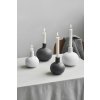 KAH 692011 692012 Four Globo candleholders on table