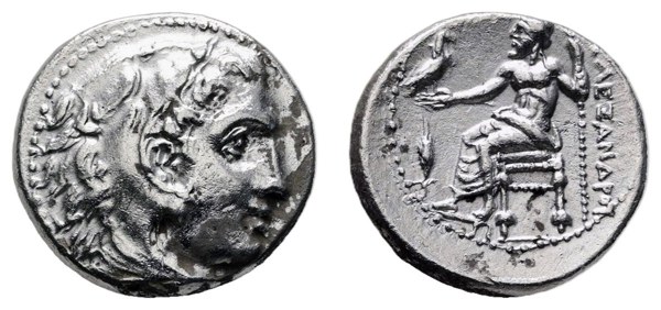 Drachma Alexandra III. Velikého, hlava Hérakla v lví kůži a trůnící Zeus