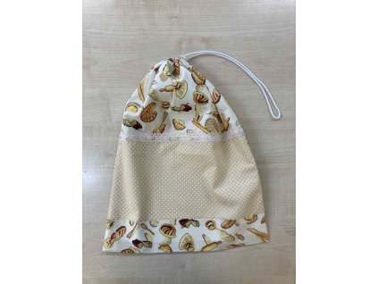 Kenyeres zsák croissant mintával, fehér zsinórral és dekorcsipkével