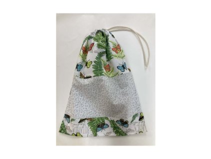 Behúzós frissentartó kenyereszsák pillangós és páfrányos mintával, álló pozícióban.