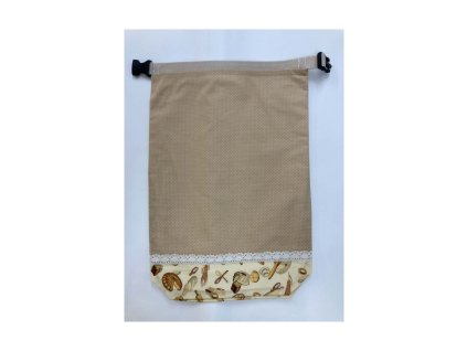 Bézs pöttyös kenyérzsák péksütemény mintás aljjal és roll-top záródással kiteritve