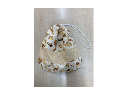 Kiscipós zsák összehúzható madzaggal, péksütemény mintás pamutvászonnal, bézs pöttyös díszcsíkkal