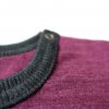 Glueckskind Body zwetschke 86 92 100 bio GOTS MerinoWolle Seide Hals Detail.webp