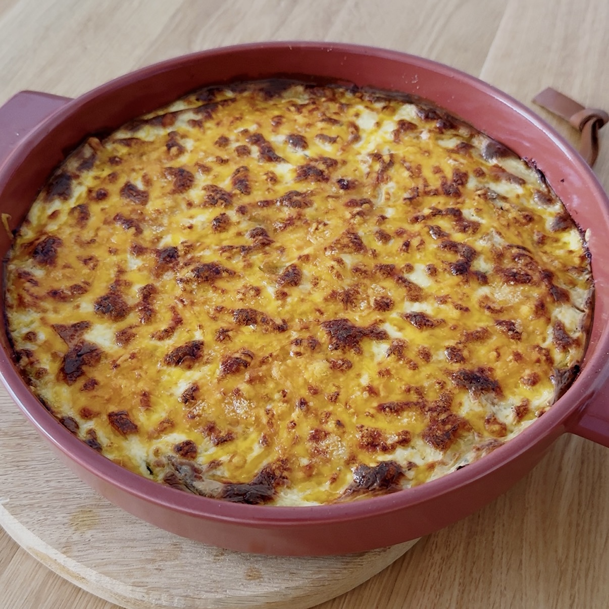 Zapečené brambory s karamelizovanou cibulí