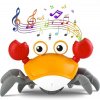 Interaktivní prchající krab s melodiemi oranžový