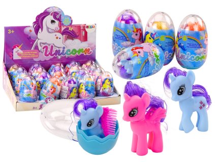 Figura colorată de unicorn într-un ou magic cu un pieptene mixt