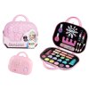 Trusa de machiaj și unghii într-o pungă de cosmetice roz