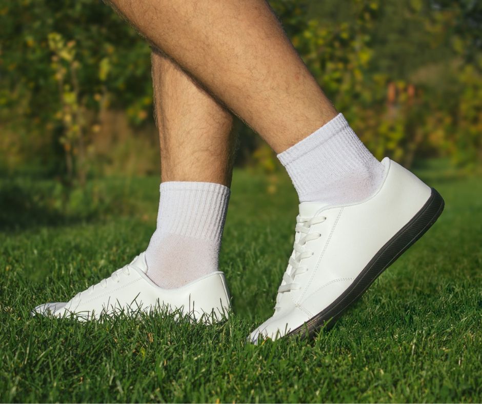 Barefoot shoes Mitochondriak® on grass, grounding and earthing