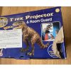 T-Rex projektor a strážca izby - poškodený obal