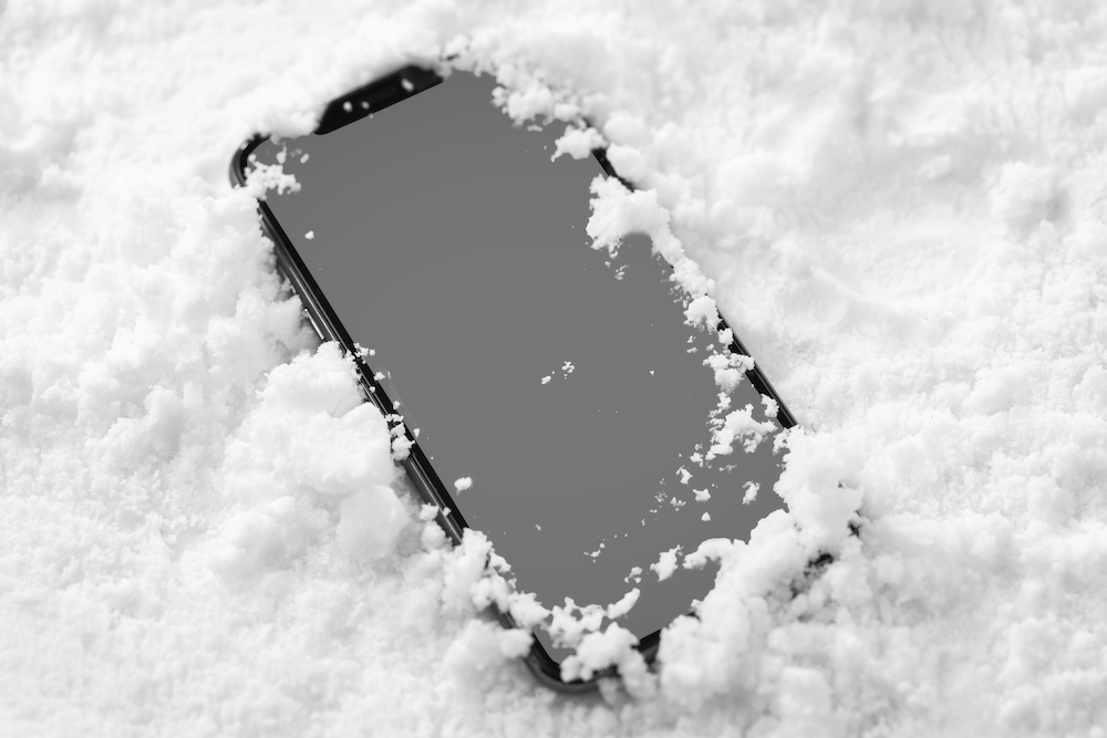 close-up-view-smartphone-snow
