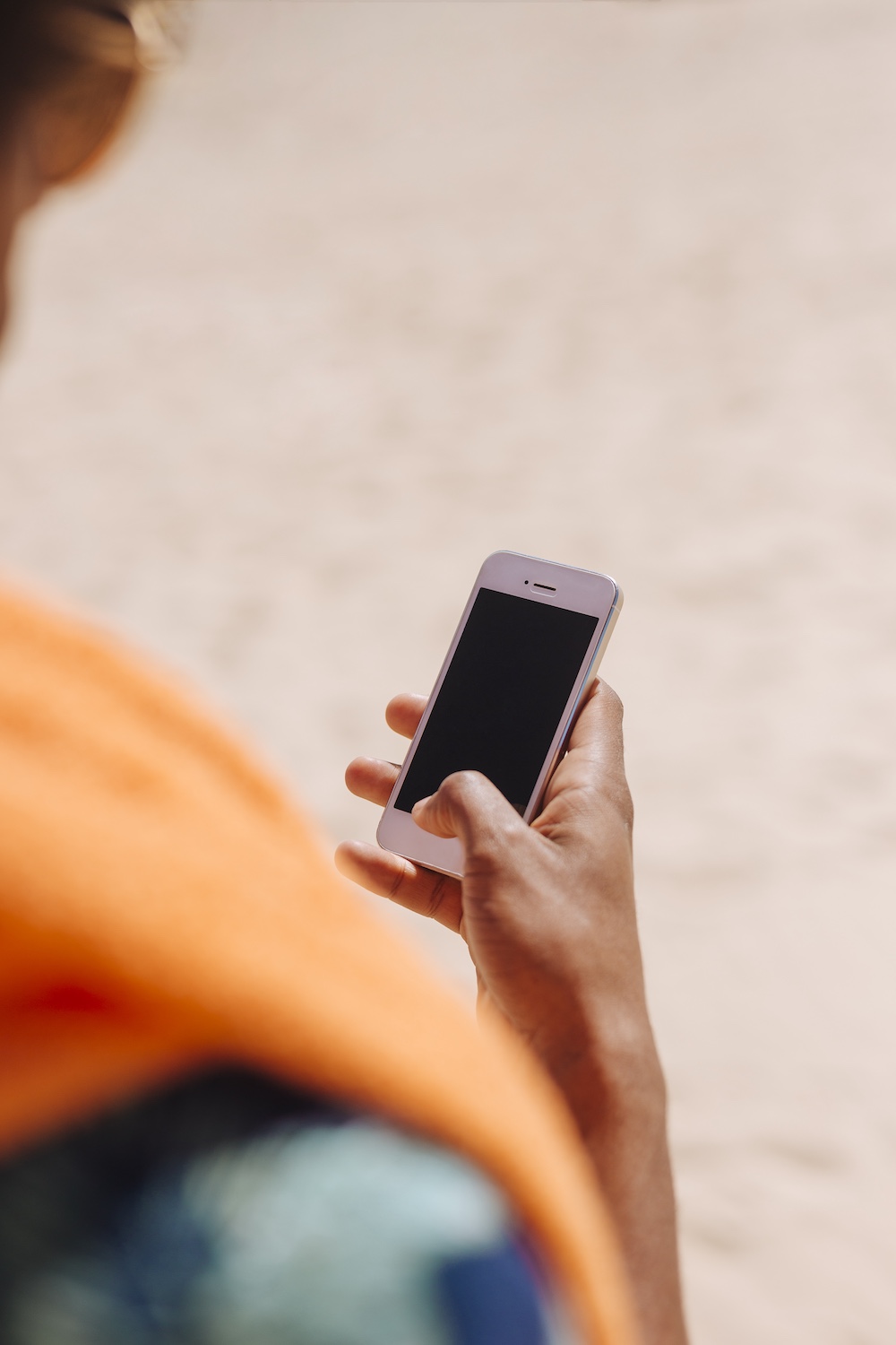 male-holding-smartphone