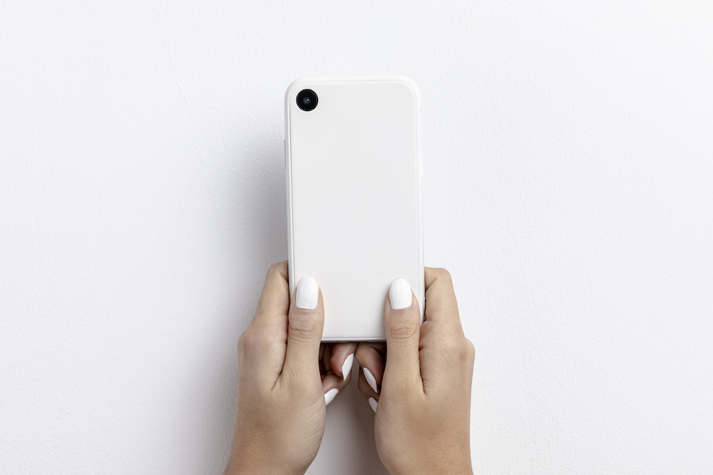 front-view-hands-holding-smartphone