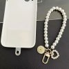 Korálkový přívěšek s perlami na ruku pro telefon