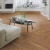laminatova podlaha kronooriginal herringbone 8 dub harlech v obyvacke s bicyklom 22842