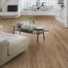 laminatova podlaha kronooriginal atlantic 8 dub hillside v obyvacke s bicyklom 17585