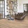 vinylova podlaha parador basic 30 dub 1604831 v interieri s kniznicou