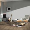 kompozitna podlaha parador modular one dub 1730804 v interieri s gitarami