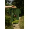 Hand holding tshirt in nature (3)