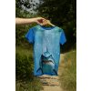 Hand holding tshirt in nature