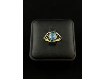 Zlatý prsten s modrým zirkonem