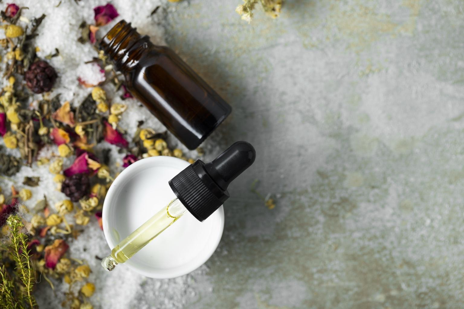 top-view-body-serum-table-copy-space-output