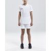 Dětské sportovní kraťasy Craft bílé na modelu