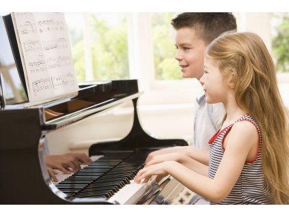 photodune 332496 brother and sister playing piano l