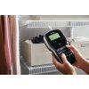 LM280 1815990-dymo-labelmanager-280-black-on-white-1in-storage-closet-close-up-of-hand-holding-label-maker-in-use